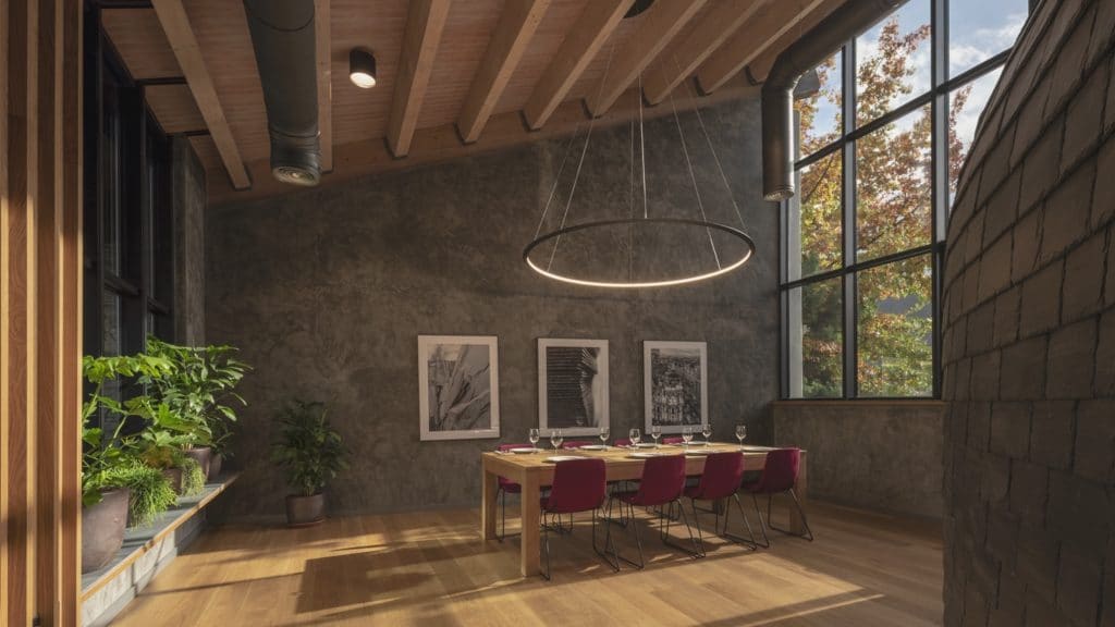 Mesa y techo en Interiorismo Estratégico en comedor para clientes de CUPA Pizarras